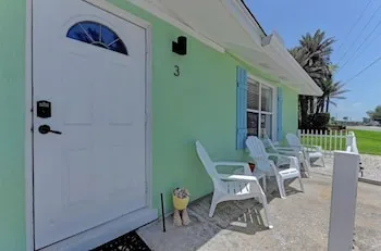 Palm Cottage by RedAwning