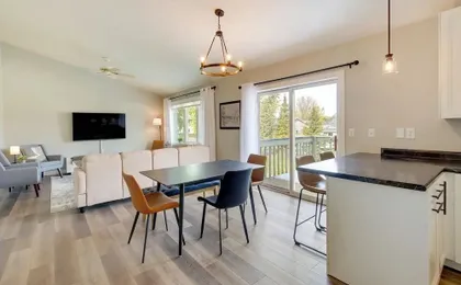 Bright Little Chute Condo w/ Deck & Yard!