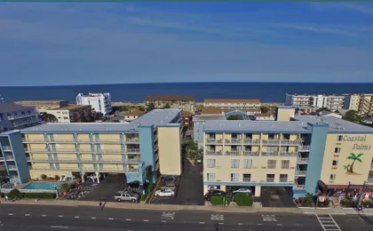 Coastal Palms Inn & Suites
